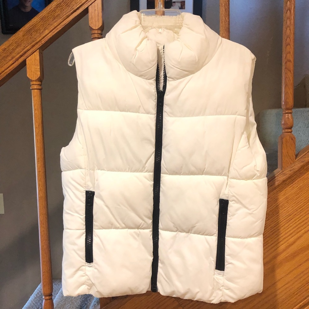 White puffer vest.